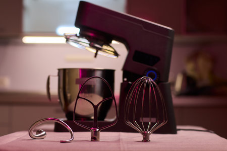 A versatile kitchen mixer with attachments designed specifically for baking needsの写真素材