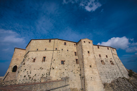 Breathtaking Scenic Aerial View of the Historical Castle Surrounded by Vibrant Lush Autumn Landscapeの写真素材