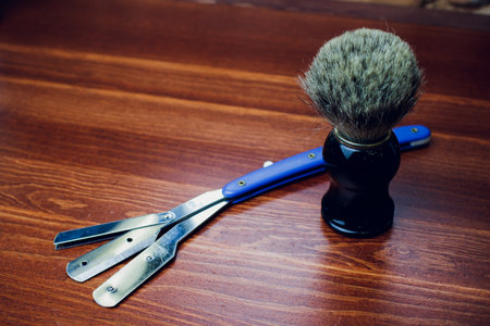 Discover Classic Barber Tools Straight Razors and Shaving Brush for modern grooming ritualsの写真素材