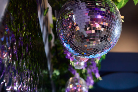 Experience the Stunning Disco Ball Reflections at an Exciting Nightclub Event Tonight