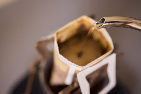 Brewing Coffee with a Precision Pouring Kettle for an Enhanced Experience and Enjoymentの写真素材