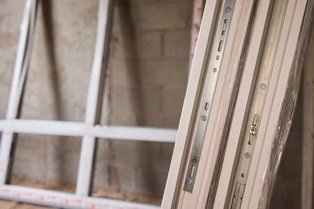 Stacked window frames are now fully prepared and ready for the upcoming installation process