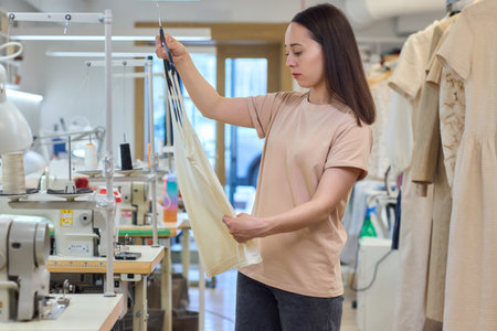 A Talented Fashion Designer is Diligently Engaged at Work in a Creative and Inspiring Studio Space