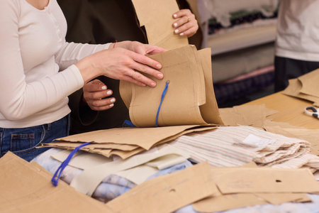 Tailoring Craftsmanship A Fashion Designer at Work Creating Beautiful Patterns with Precision