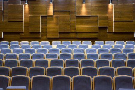 A visually appealing Empty Auditorium Seating arrangement showcasing Modern Chairs for eventsの写真素材