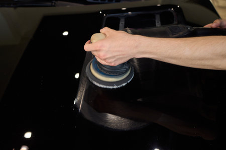 A Detailed Close Up of the Car Polishing Process in the Field of Automotive Detailing