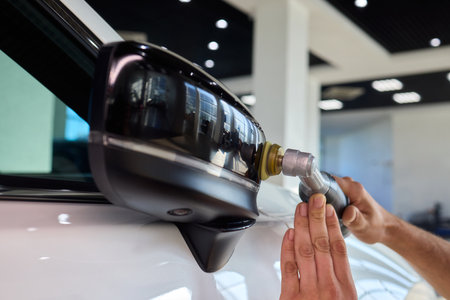 Experience the Art of Professional Car Detailing with a Polishing Tool in Action Todayの写真素材