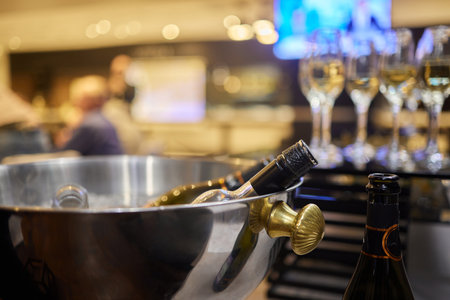 An Elegant Wine Bottle Nestled in an Ice Bucket to Enhance Your Fine Dining Experienceの写真素材