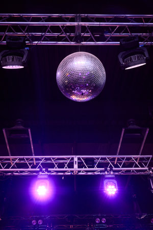 Experience the vibrant disco ball lights that truly enhance the nightlife atmosphere and energyの写真素材