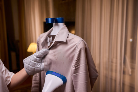 Steam your clothes at home for a fresh and stylish look thats easy to maintainの写真素材