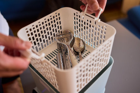 Kitchen Tools and Equipment Arranged Neatly in a Basket for Easy Access and Organizationの写真素材