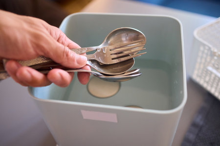 Kitchen Tools and Equipment Arranged Neatly in a Basket for Easy Access and Organization