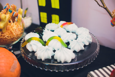 A beautiful array of Colorful Halloween Themed Cookies beautifully arranged on a Plateの写真素材