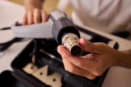 This versatile heat gun is ideal for various DIY projects, home repairs, and renovationsの写真素材