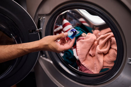 Laundry Care A Detailed Guide on Adding Detergent to Your Washing Machine Efficientlyの写真素材