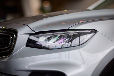 Close up of a cars headlight, part of automotive design