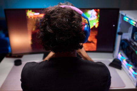 Enjoying an exciting gaming session with a controller and large screen for immersive gameplay