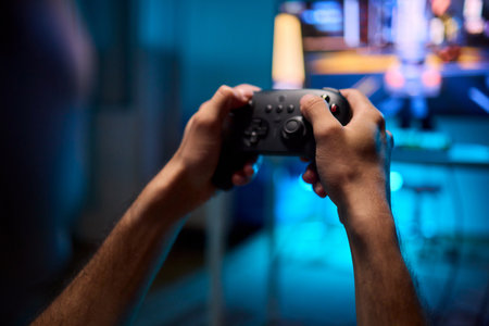 Enjoying an exciting gaming session with a controller and large screen for immersive gameplay