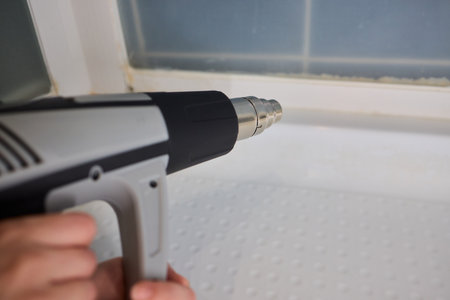 Utilizing a Heat Gun for Various Home Repair and Renovation Projects and Improvementsの写真素材