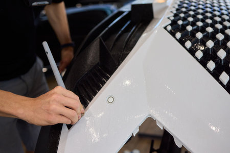 Applying a Protective Film on the Surface of Your Car for Enhanced Durability and Shineの写真素材