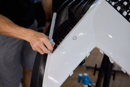 Applying a Protective Film on the Surface of Your Car for Enhanced Durability and Shineの写真素材