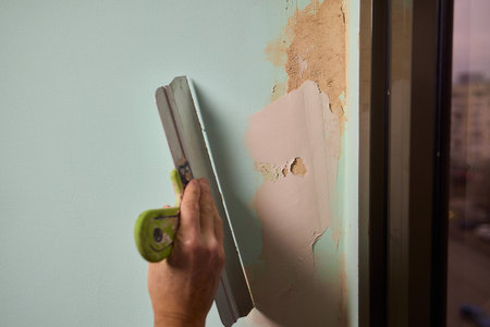 The Wall Repair Process Involves Properly Using Spackling Paste for a Quality Finishの写真素材