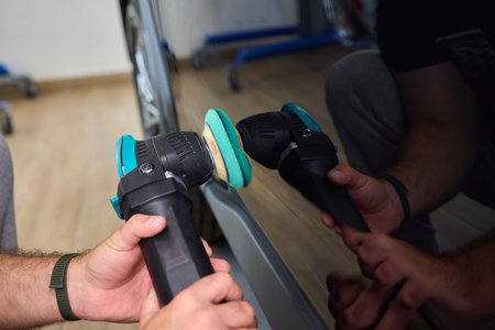 Polishing black car surface thoroughly, Detailed buffing to achieve showroom quality shine, Expert...