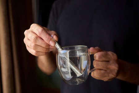Warm tea preparation, Relaxed moment with steaming hot beverage in tranquility, Quiet domestic...