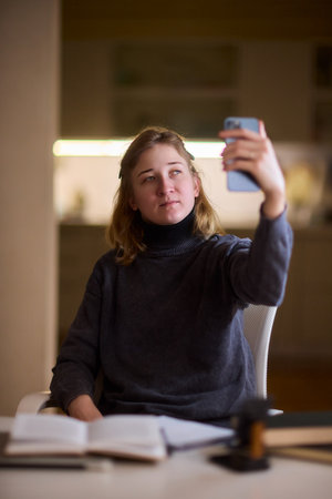 Young lady with cerebral palsy studying using technological aids, Enthusiastic woman with cerebral...
