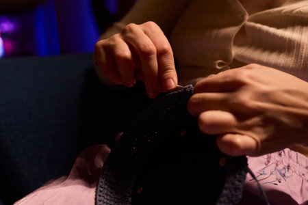 Crochet workshop scene, Artisan at work with yarn, Cozy crafting space with textured handmade stitches, Quiet studio environment dedicated to knitting and crochet crafts todayの写真素材