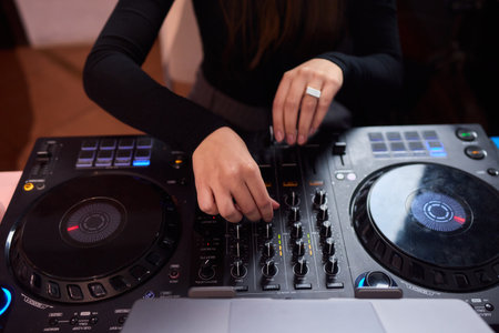 DJ setup overview, Energetic club DJ performing with digital controller in action, Content creator...