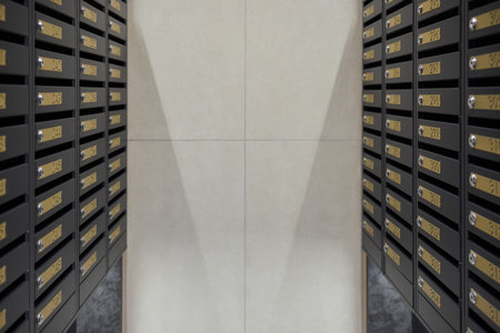 Neatly arranged mailboxes along corridor walls, Orderly line of mailboxes in city housing corridor,...