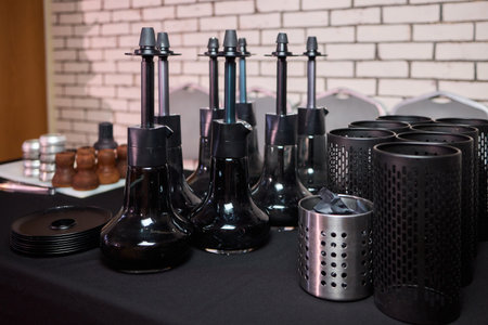 Modern lounge with premium hookah accessories and cozy lighting ambiance, Sophisticated setting...