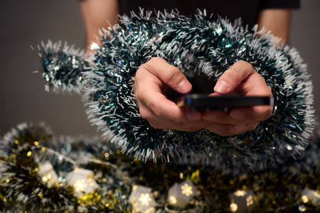 Digital holiday planning, Person reviewing online presents on tabletop, Warm indoor scene of...