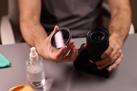 Attaching polarizing filter to camera lens carefully. Detailed steps for carefully attaching and...