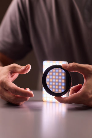 Polarizer smartphone display. Mobile device with polarizing filter and grid pattern focus. Detailed...