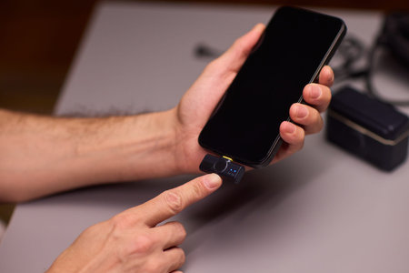 Lavalier attachment to phone for rapid interview recordings. Onsite interview preparation involving...