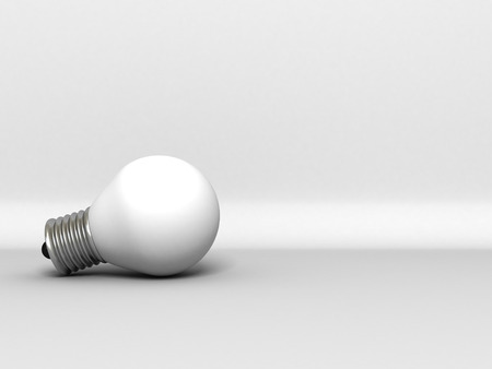 single light bulb on gray background with copy space for textの写真素材