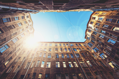 Old Courtyard In St. Petersburg. Bottom View To Vintage Old Buildings. Soft Color Effectの写真素材