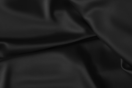 Black luxury wavy rippled glossy silk drapery cloth fabric. Abstract backgroundの写真素材