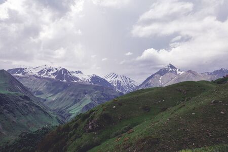 Mountains rocks landscape with cloudy dramatic sky. North nature background.の写真素材