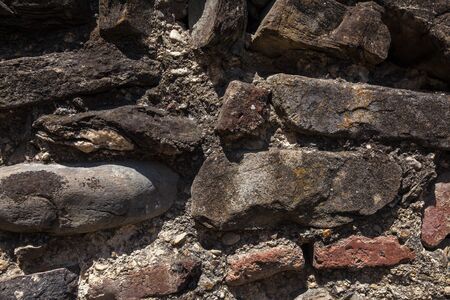Old cracked stone masonry wall texture. Grunge design backgroundの写真素材