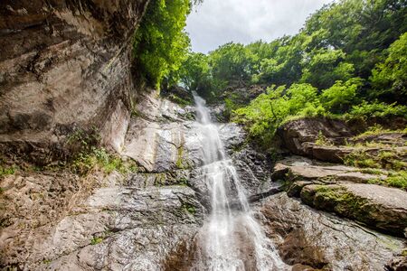 Mountain river waterfall close up. Tropical nature backgroundの写真素材