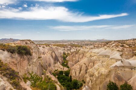 Beautiful mountains rocks landscape. Cloudy sky. Cappadocia, Nevsehir Province, Anatolia Region of Turkeyの写真素材