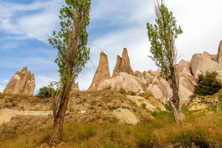 Beautiful mountains rocks landscape. Cloudy sky. Cappadocia, Nevsehir Province, Anatolia Region of Turkeyの写真素材