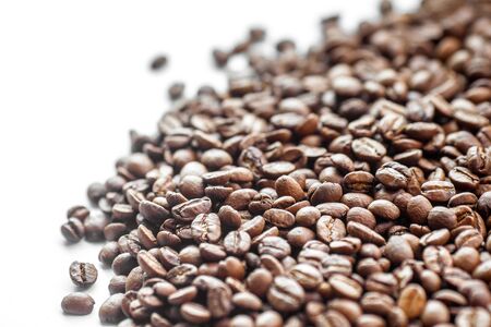 Roasted coffee beans heap background. Close up macro photo shootの写真素材