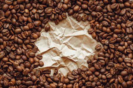Roasted coffee beans heap background. Close up macro photo shootの写真素材