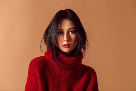 Casual style beautiful young girl. Studio photoshoot. Attractive skinny modelの写真素材