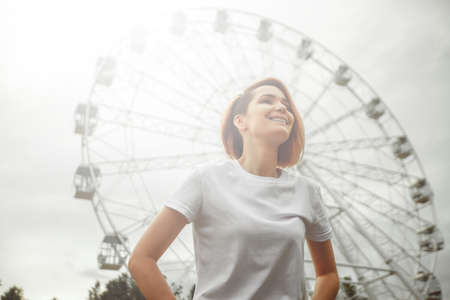 Beautiful tourist girl on city street. Gorgeous young model woman outdoor portrait. Fashionable wear.の写真素材