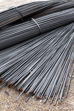 Pile of rusty metal fittings. Reinforced steel for building and construction